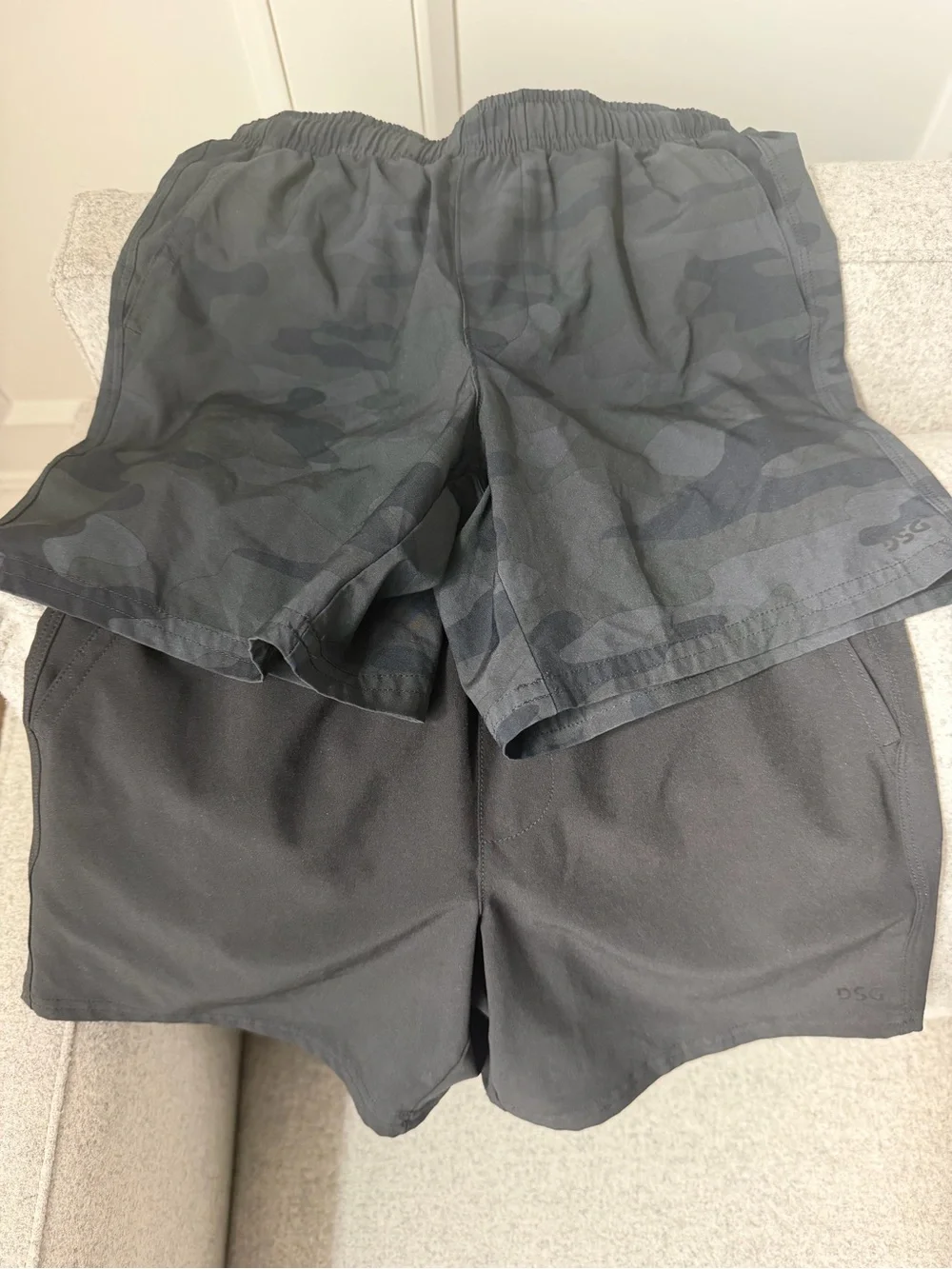 Kid’s Black and Dark Gray Camo and black Dick’s Sporting Goods DSG Shorts